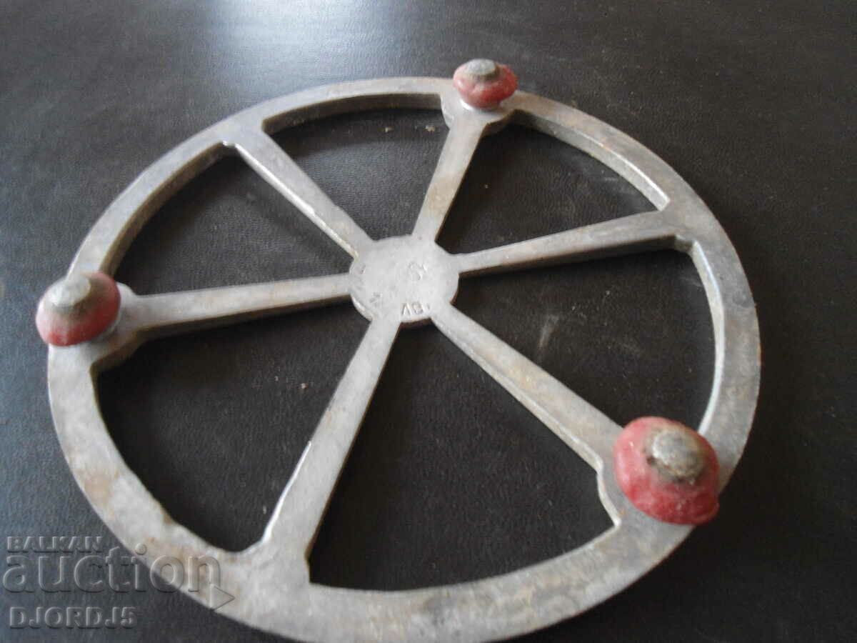 Auction  An old metal stand