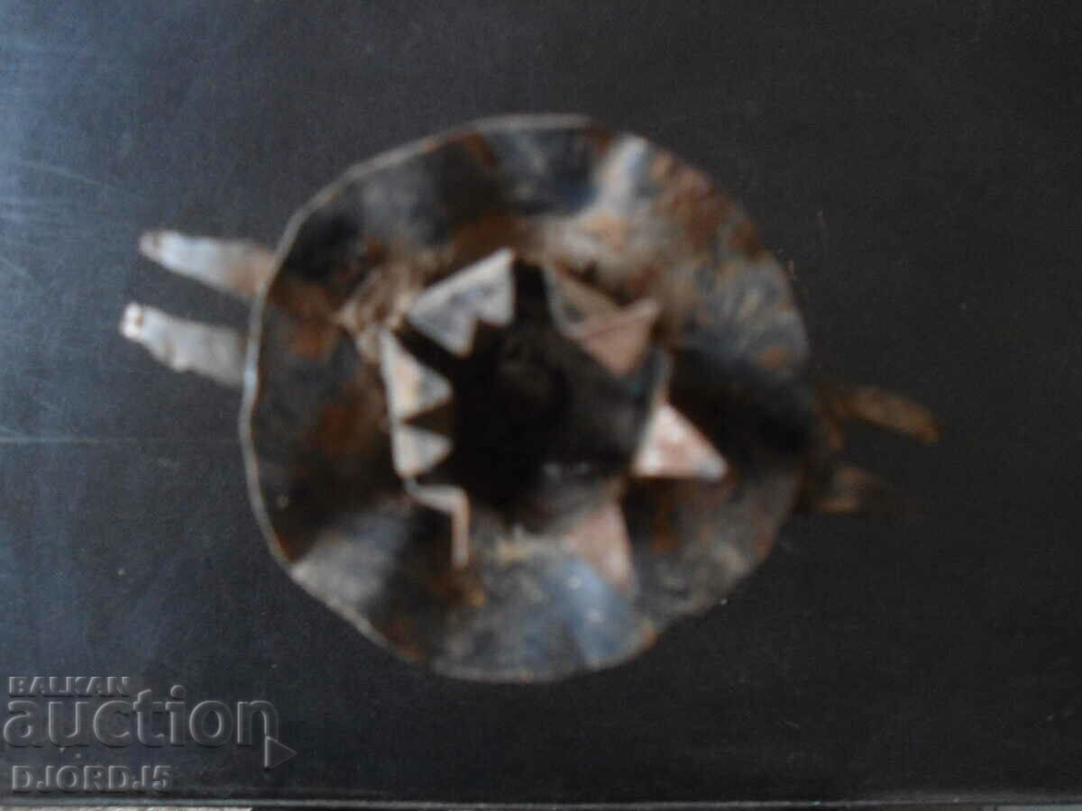 Auction An old forged candlestick Auction An old forged candlestick