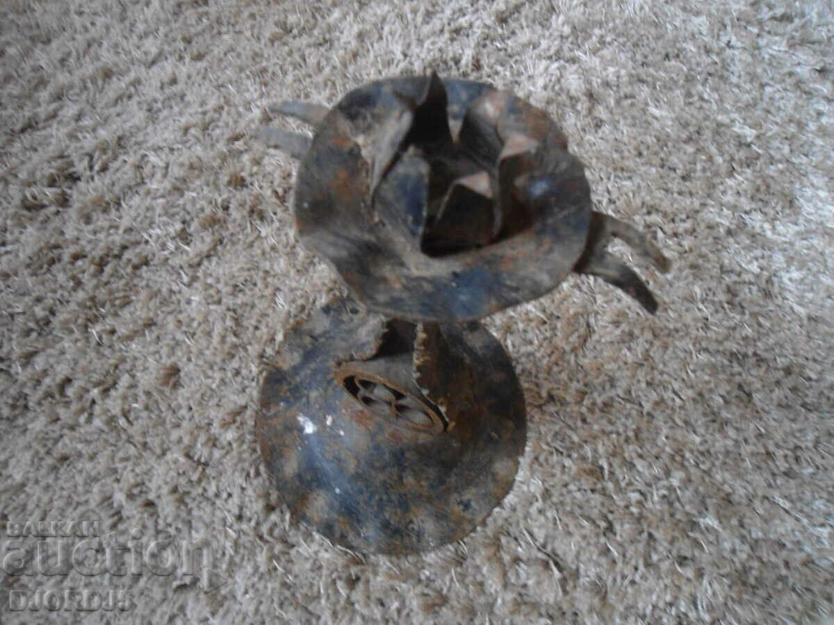 Delivery of An old forged candlestick Delivery of An old forged candlestick