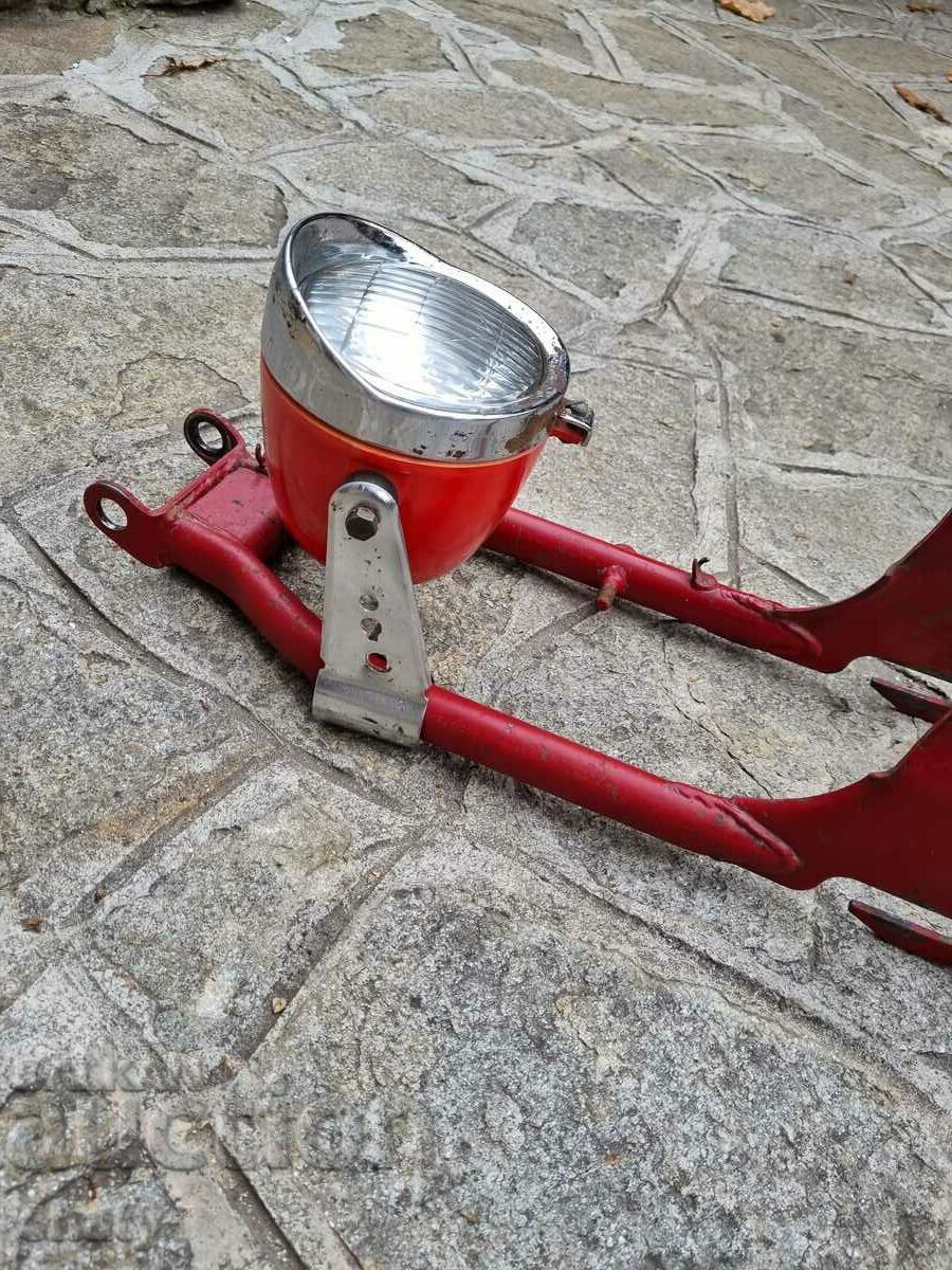 Headlight with fork.
