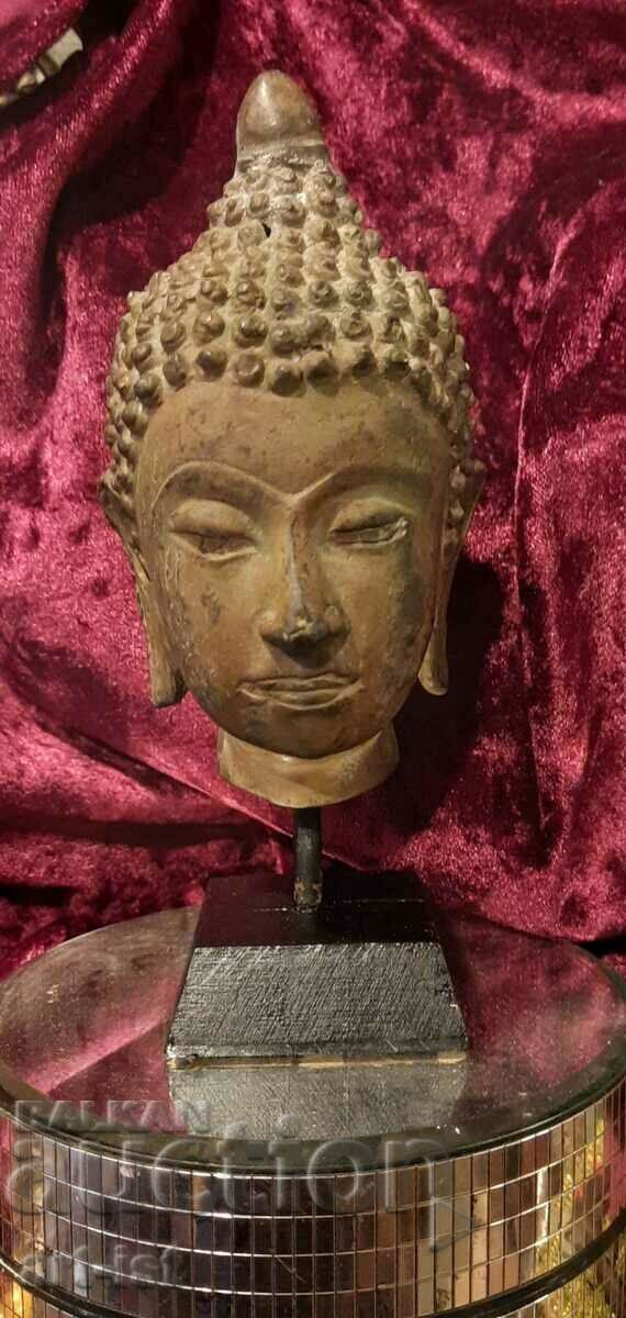 Bronze Buddha head sculpture