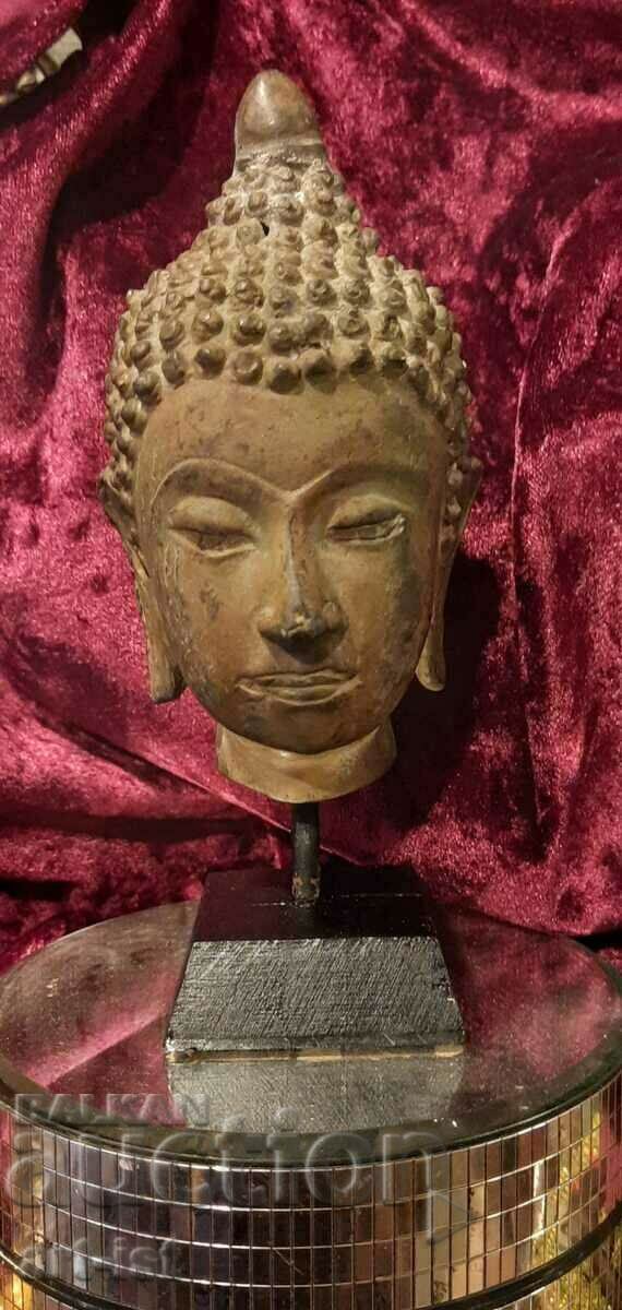 Bronze Buddha head sculpture