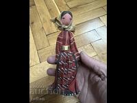 Old souvenir wooden Bulgarian doll