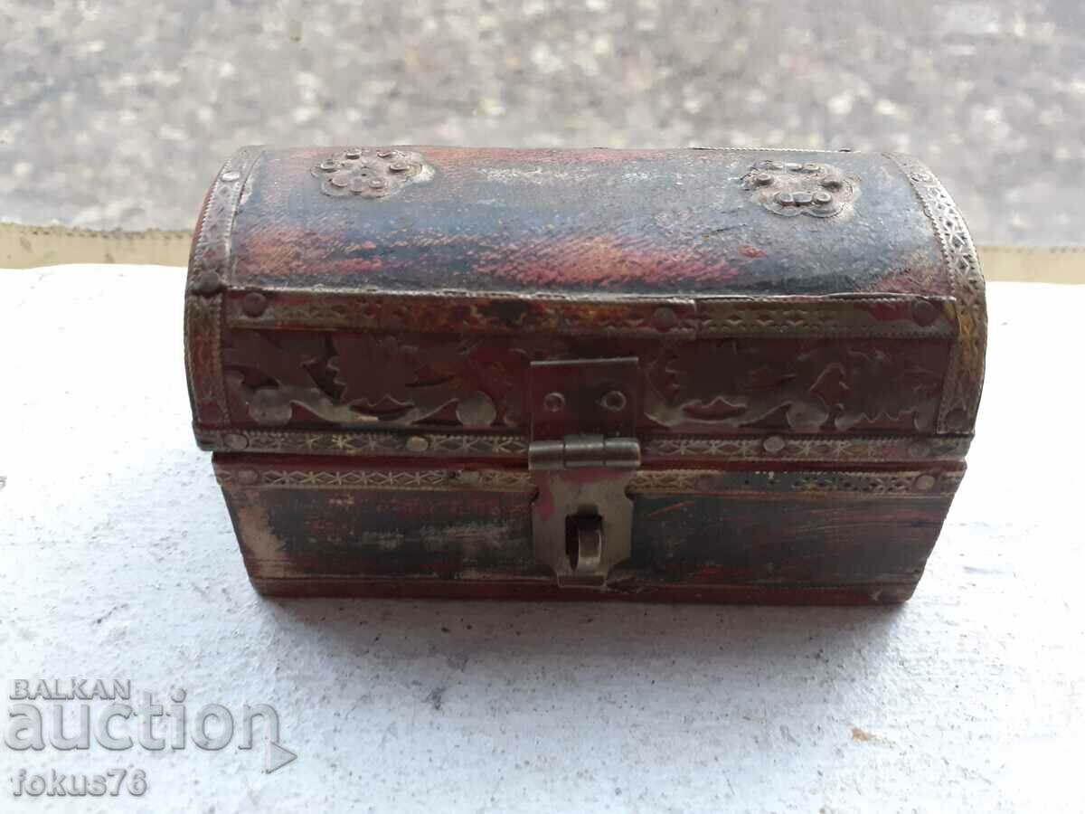 Old wooden box with brass fittings