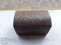 Old wooden box with bronze inlays and mother of pearl