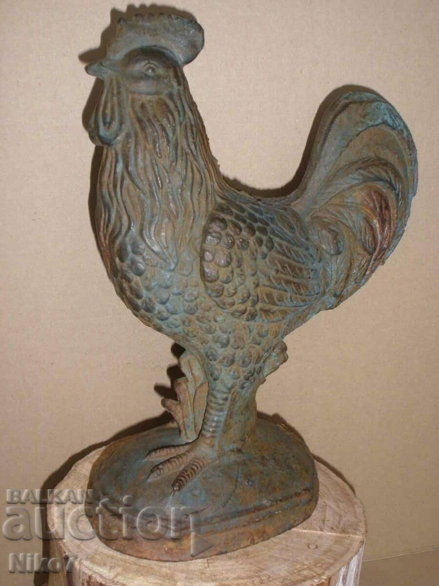 Delivery of Ancient, massive, cast iron figure (sculpture) - Rooster. Delivery of Ancient, massive, cast iron figure (sculpture) - Rooster.