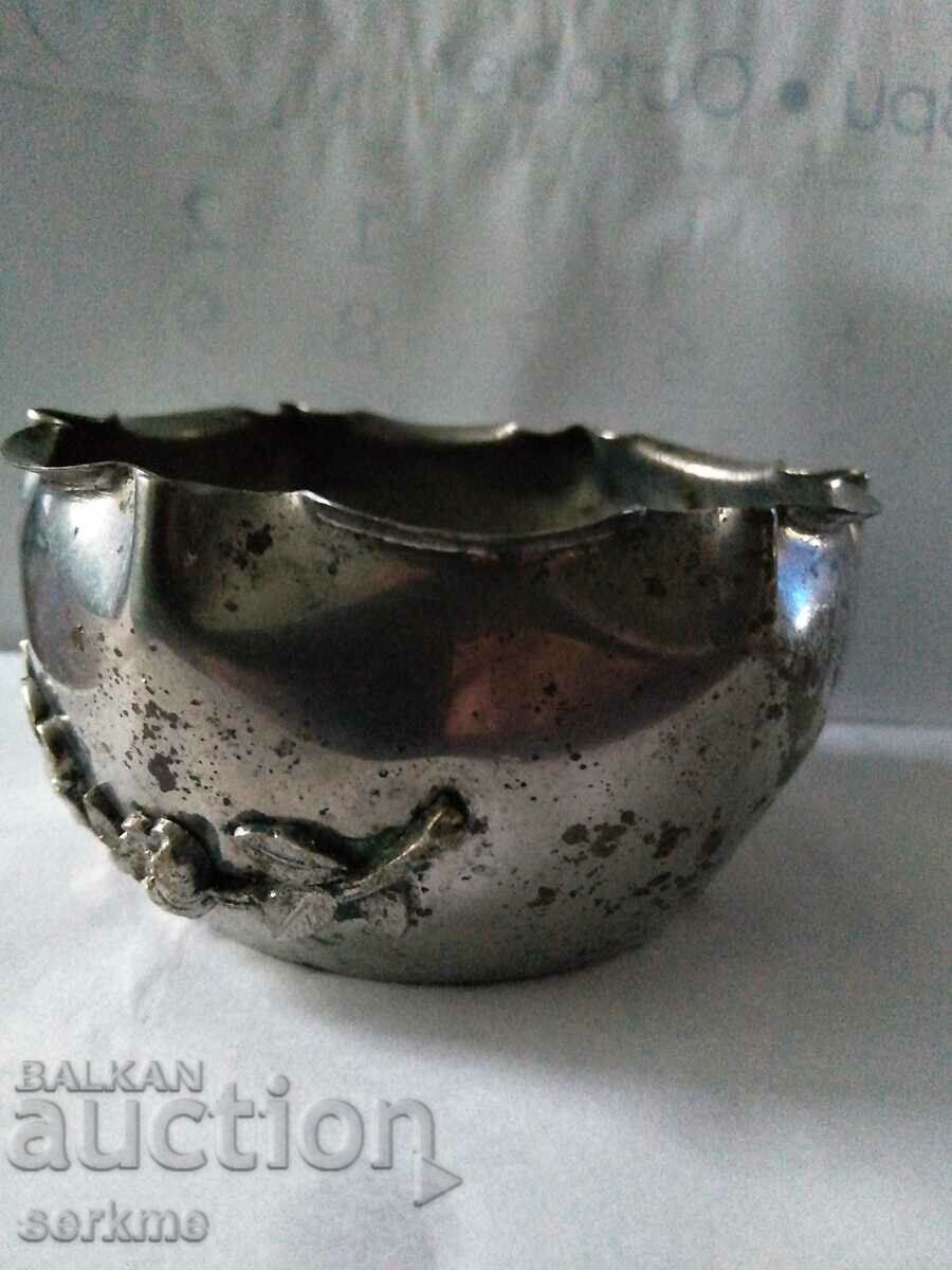 Auction Metal vessel with ornaments Auction Metal vessel with ornaments