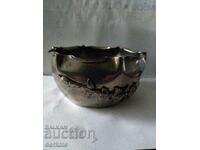 Metal vessel with ornaments