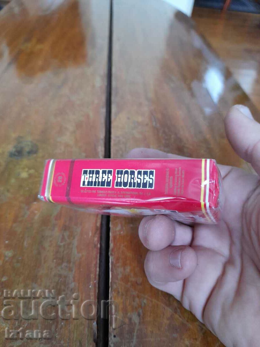 Auction  An old pack of Three Horses cigarettes