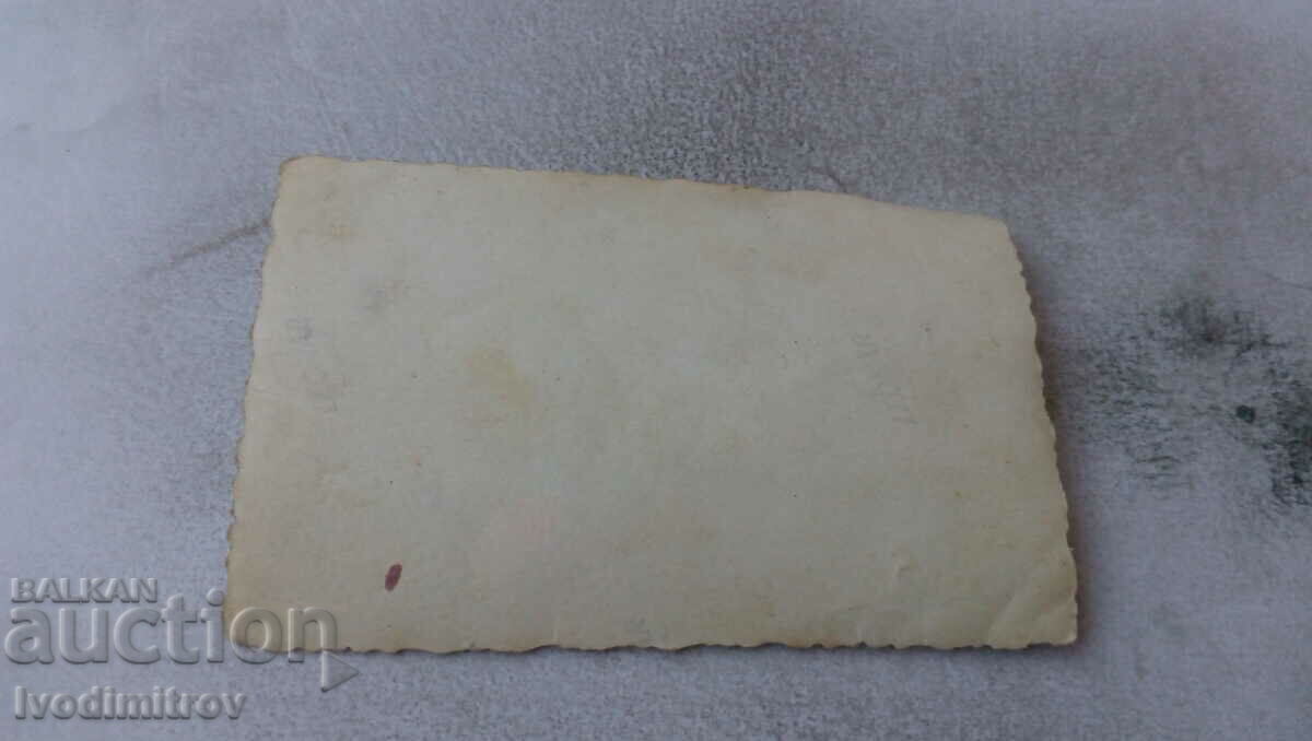 Photo Two men and a woman on a wooden bench with price 0.85 BGN | € 0.43 Photo Two men and a woman on a wooden bench with price 0.85 BGN | € 0.43