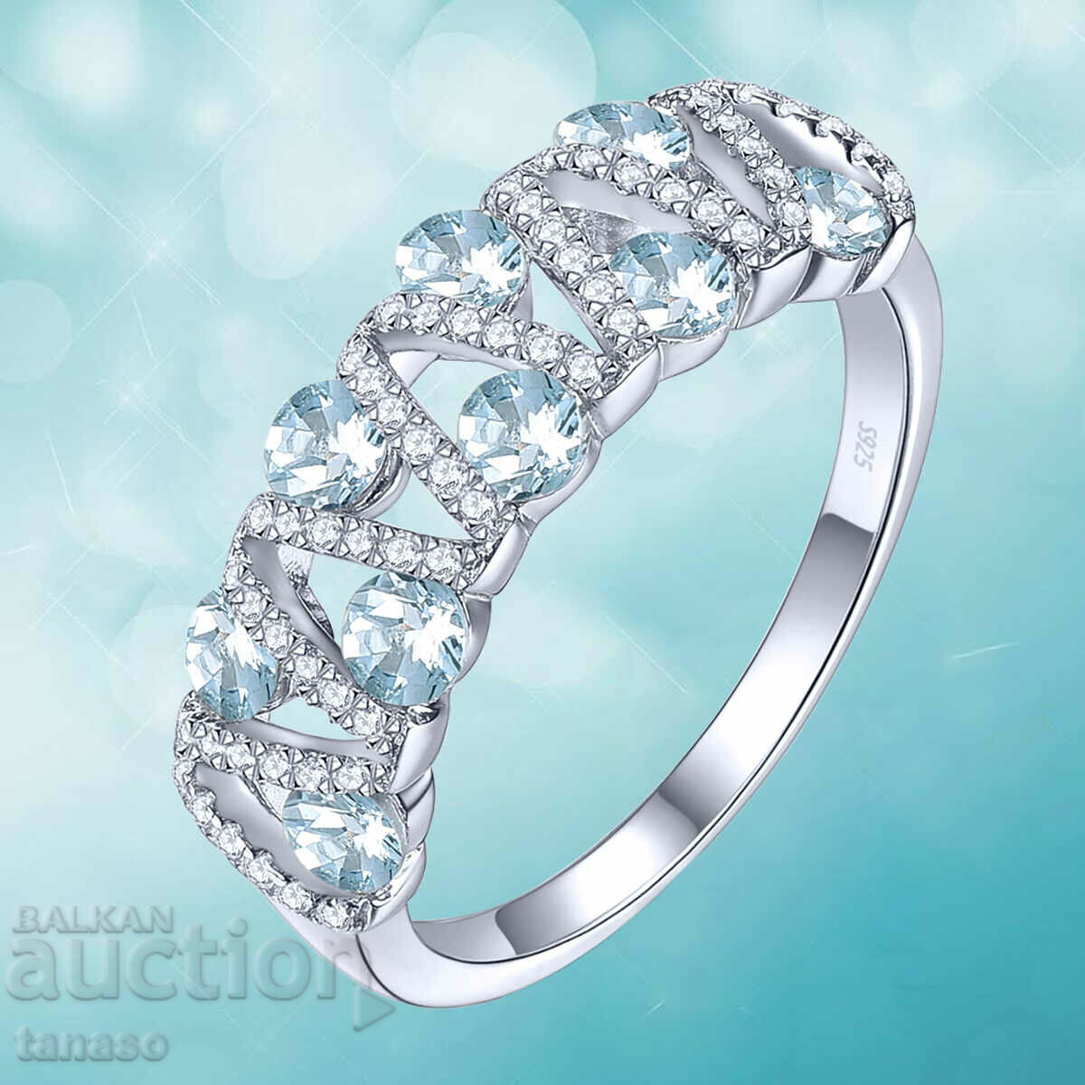 Auction  Ladies ring with aquamarines