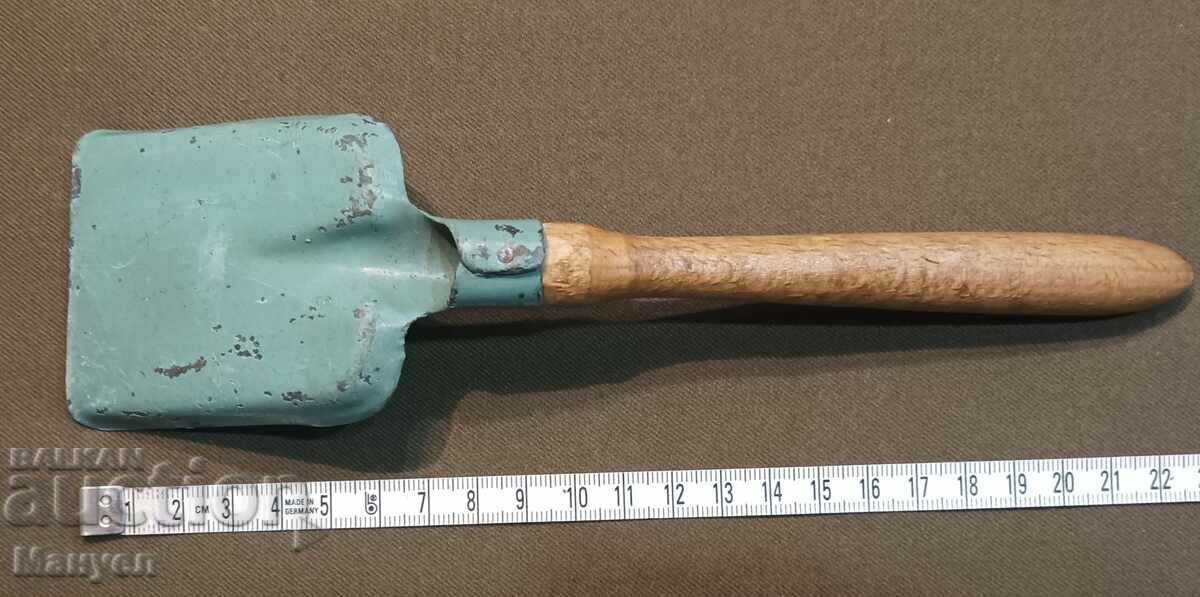 Auction  I am selling an old children's spatula