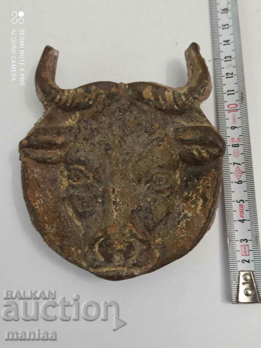 Old bronze heavy head of bill