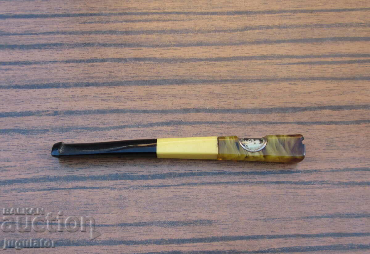 Delivery of authentic antique patterned bakelite cigarette Delivery of authentic antique patterned bakelite cigarette