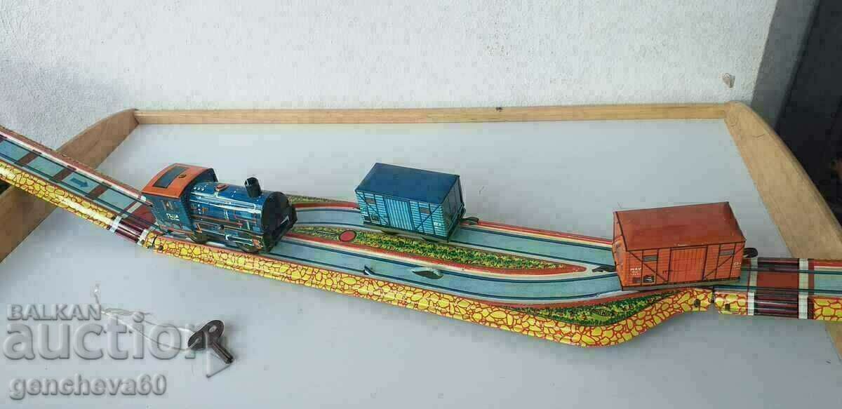 Auction Metal mechanical train with rails/1970 Auction Metal mechanical train with rails/1970