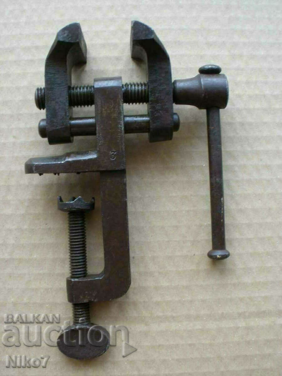 Auction Old, marked, small vise. Auction Old, marked, small vise.