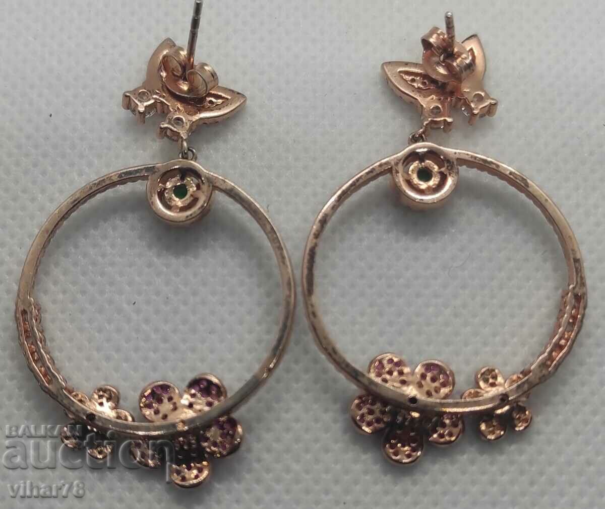 Delivery of Beautiful silver earrings with gold plating and rubies Delivery of Beautiful silver earrings with gold plating and rubies