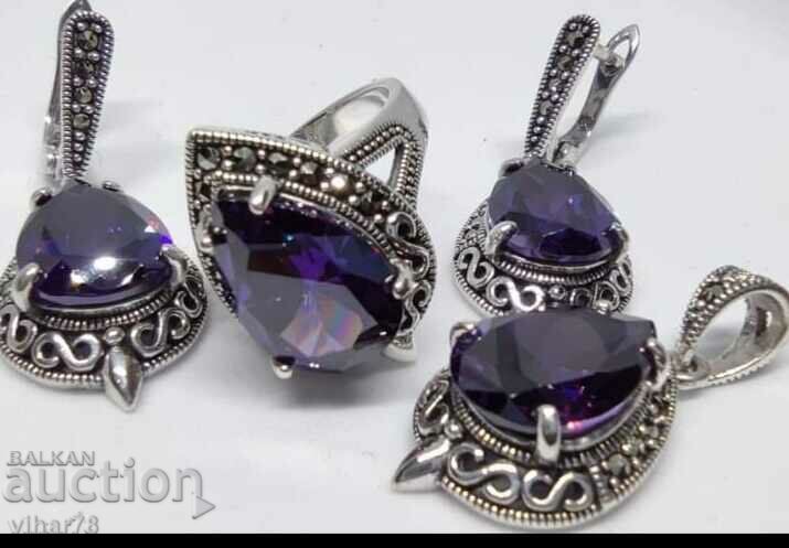 Auction Very beautiful set of earrings, pendant and ring with zircon Auction Very beautiful set of earrings, pendant and ring with zircon