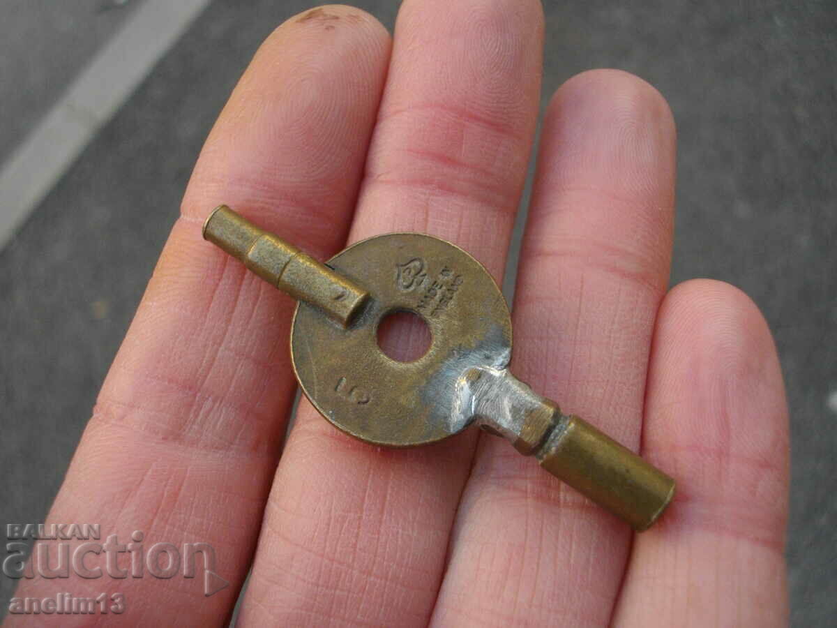 Auction OLD KEY TWO IN ONE KEY FOR WALL OR FIREPLACE CLOCK Auction OLD KEY TWO IN ONE KEY FOR WALL OR FIREPLACE CLOCK