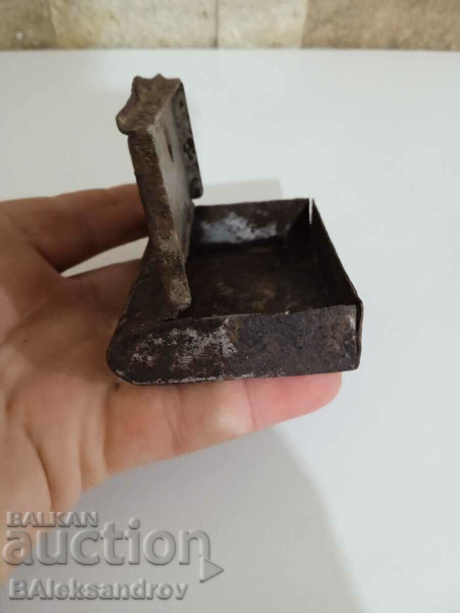 Delivery of An old metal box in the shape of a book Delivery of An old metal box in the shape of a book