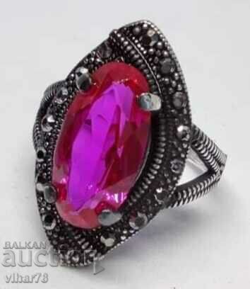 Auction  Silver ring with huge ruby and marcasite