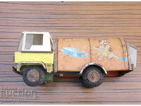 Vechi camion de gunoi de jucărie din tablă de metal