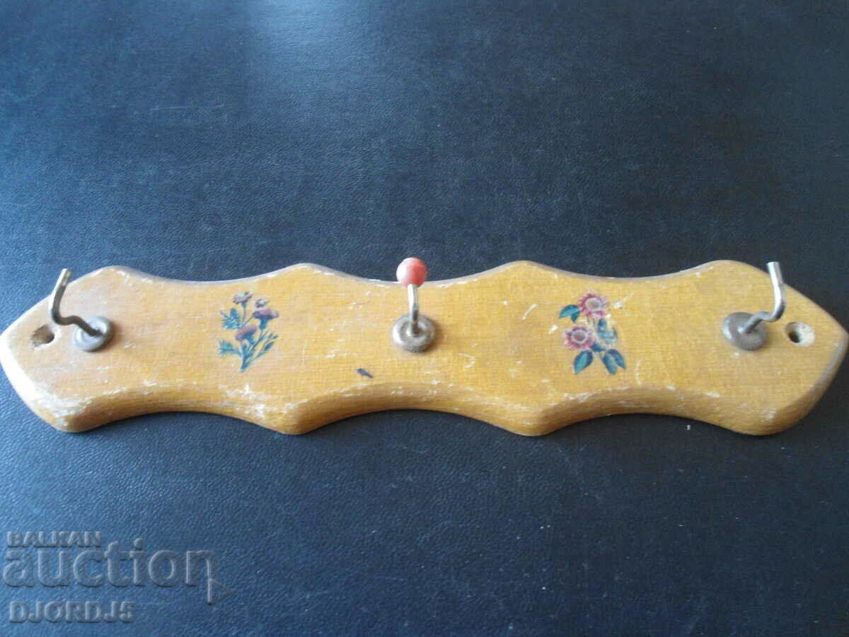 An old wooden hanger with price 5.00 BGN | € 2.56 An old wooden hanger with price 5.00 BGN | € 2.56