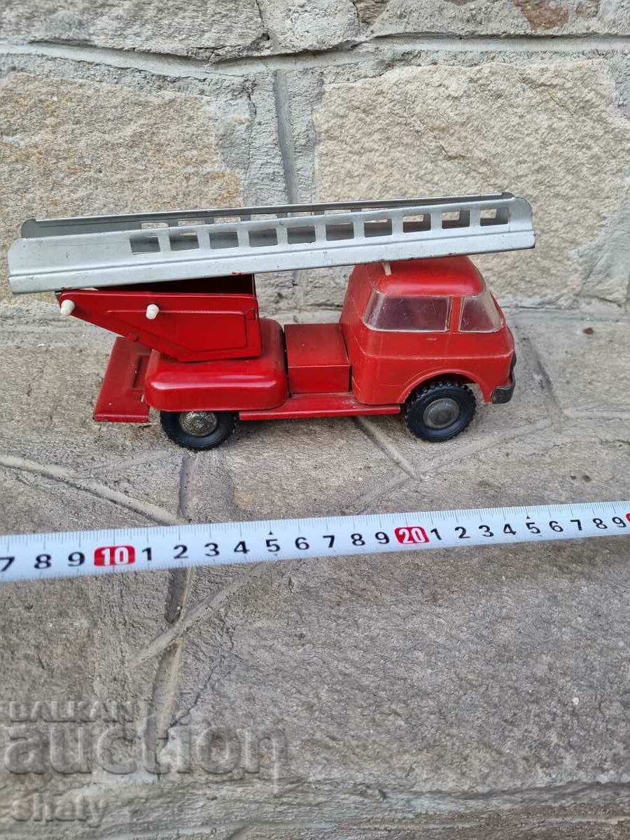 Аукцион Стара ламаринена играчка Аукцион Стара ламаринена играчка