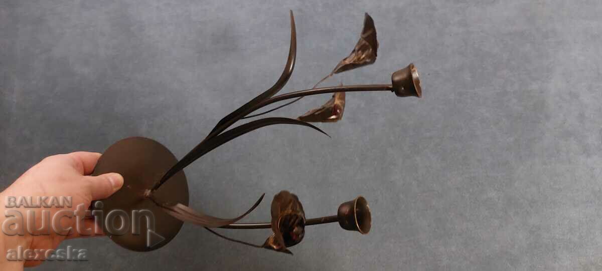 Auction An old metal candleholder Auction An old metal candleholder