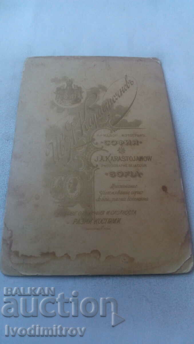 Photo Woman in black cardboard dress with price 6.85 BGN | € 3.50 Photo Woman in black cardboard dress with price 6.85 BGN | € 3.50