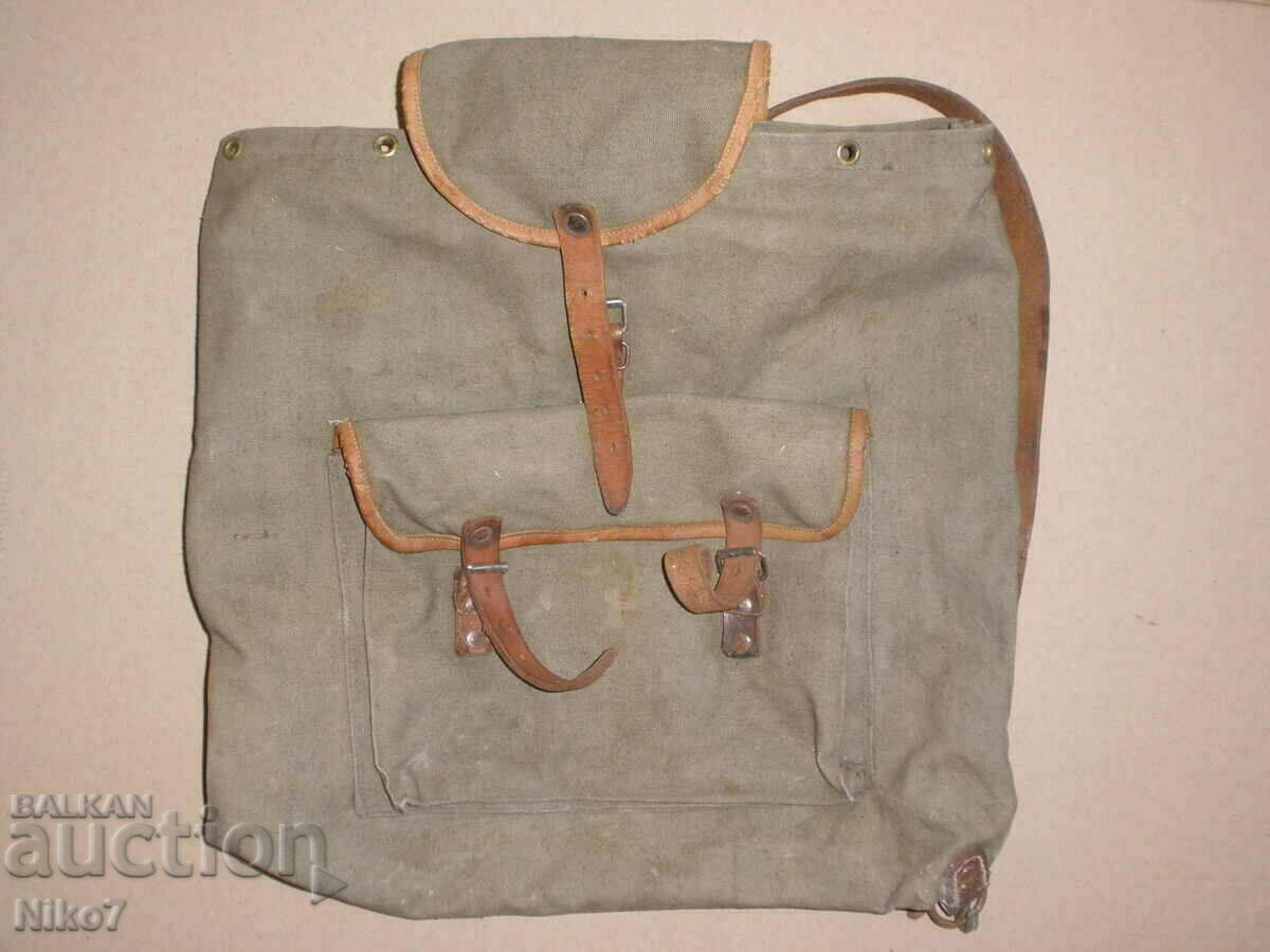 A small canvas backpack.