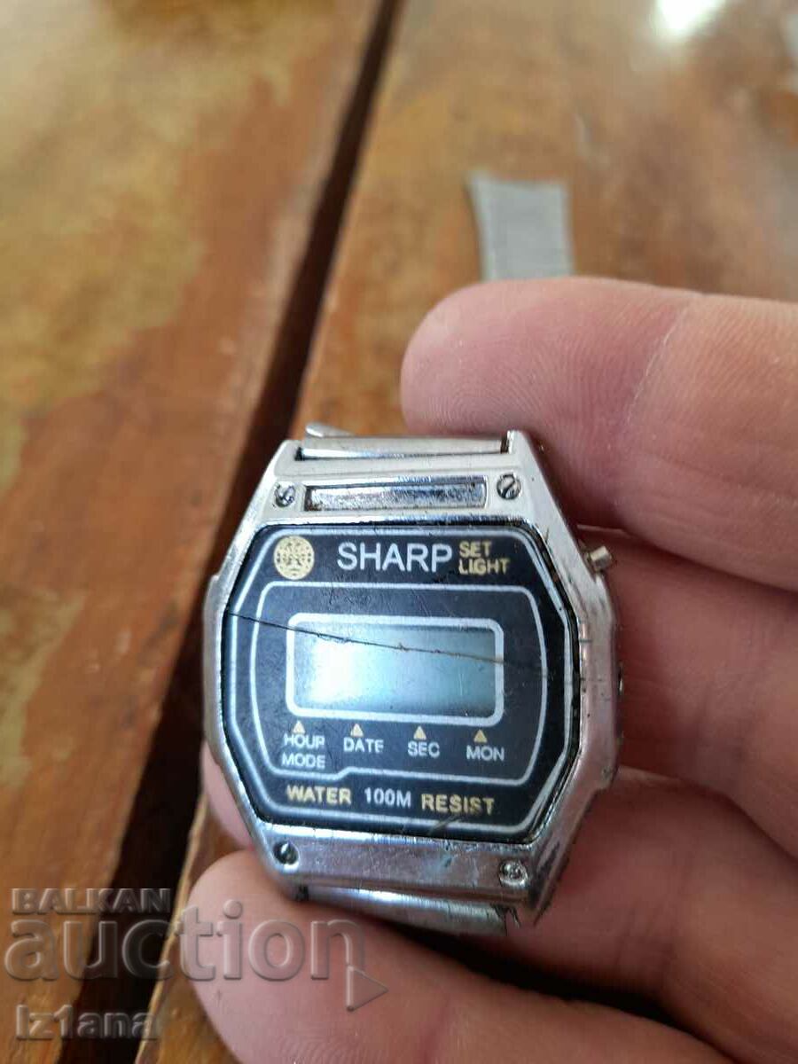 Auction Old Sharp electronic watch Auction Old Sharp electronic watch