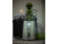 Electric centrifugal juicer for vegetables and flat
