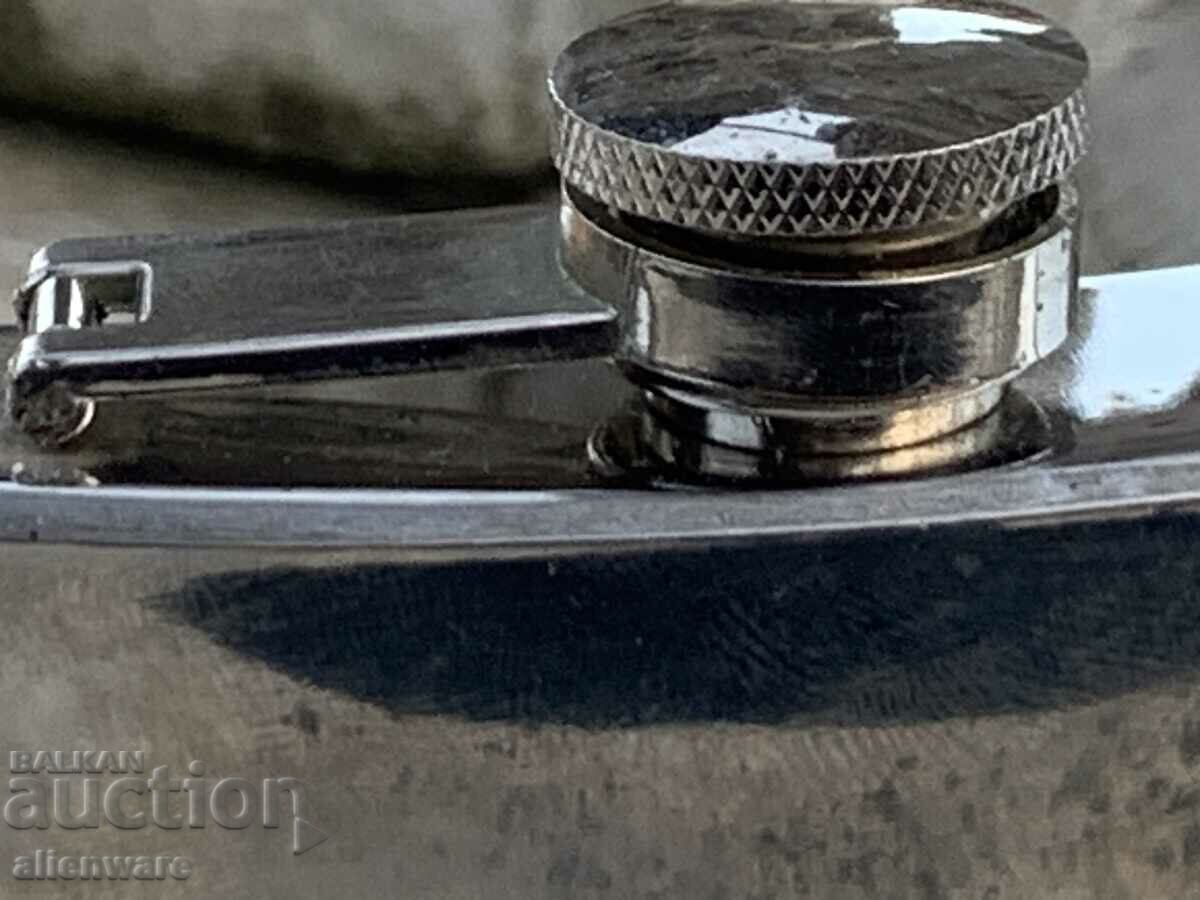 Delivery of Jim Beam metal alcohol bottle Delivery of Jim Beam metal alcohol bottle