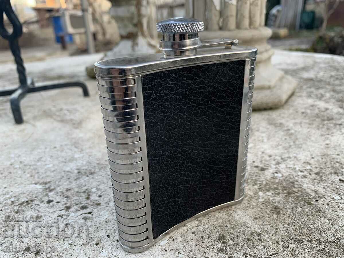 Metal and leather alcohol bottle with price 25.00 BGN | € 12.78 Metal and leather alcohol bottle with price 25.00 BGN | € 12.78