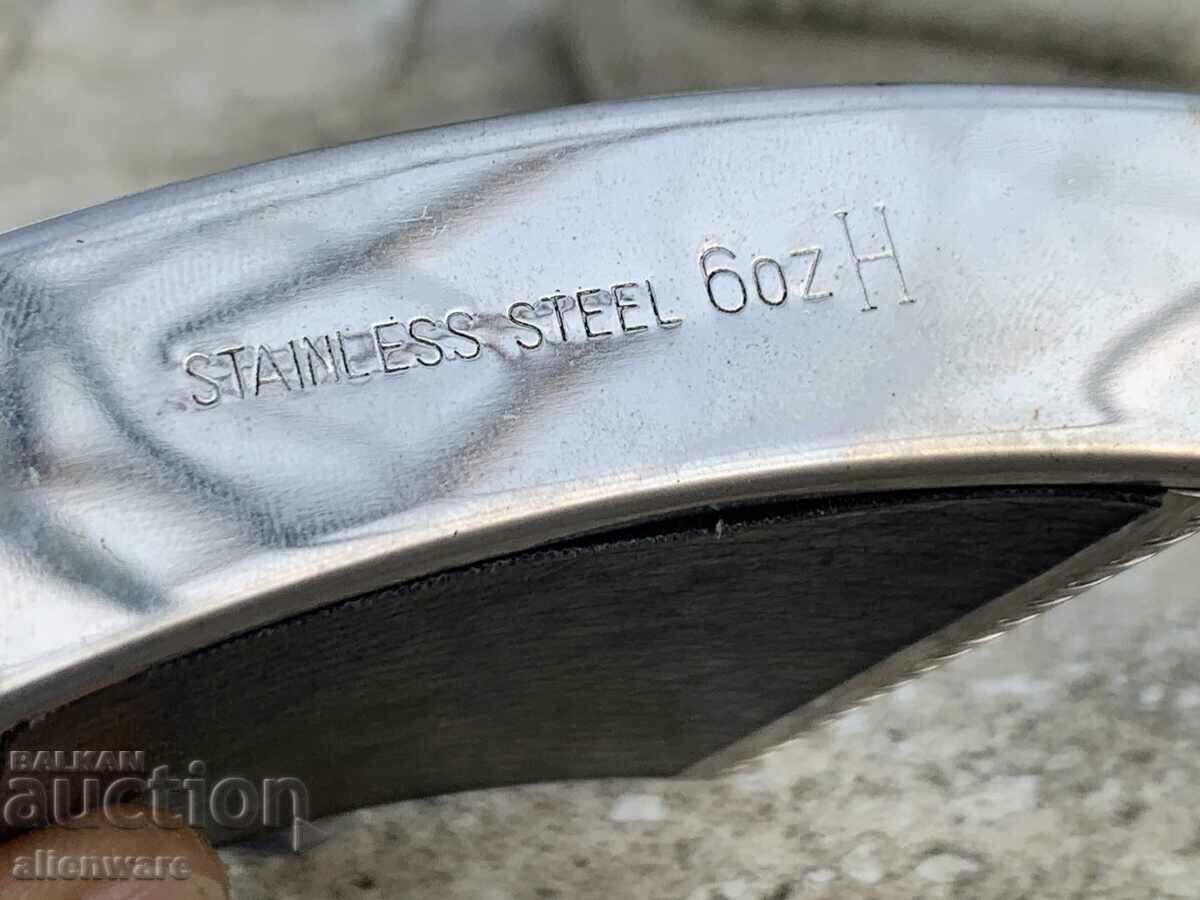 Delivery of Metal and leather alcohol bottle Delivery of Metal and leather alcohol bottle