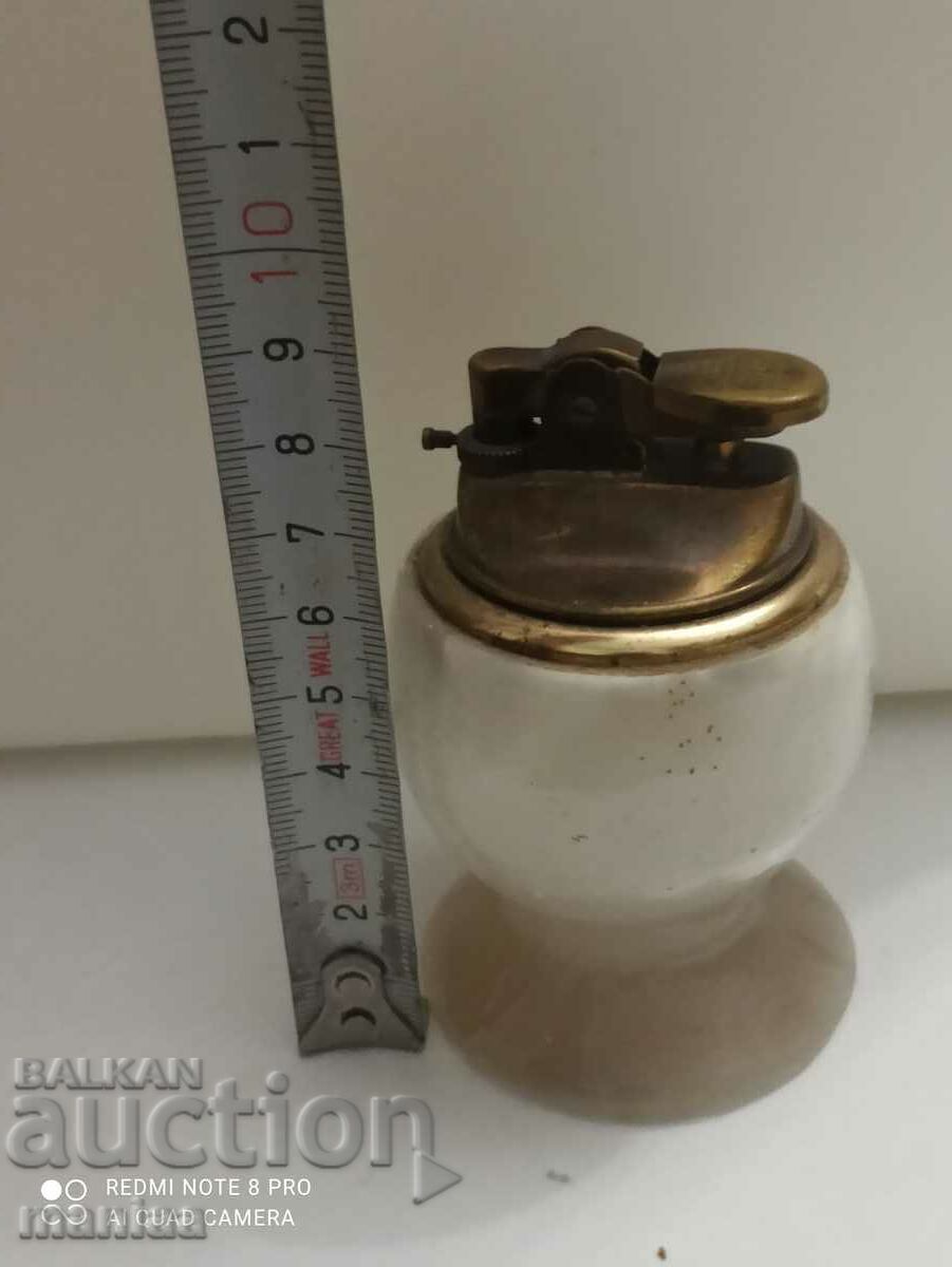 Table bronze lighter with marble with price 45.00 BGN | € 23.01 Table bronze lighter with marble with price 45.00 BGN | € 23.01