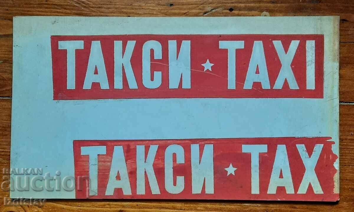 Old TAXI sign