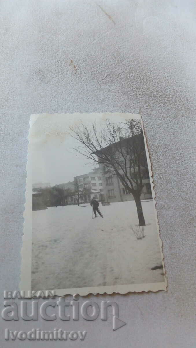 Photo Sofia A boy with skis between the blocks 1965