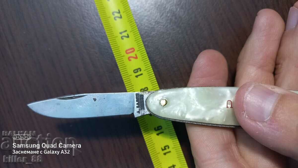 Auction Folding knife strange with markings Auction Folding knife strange with markings