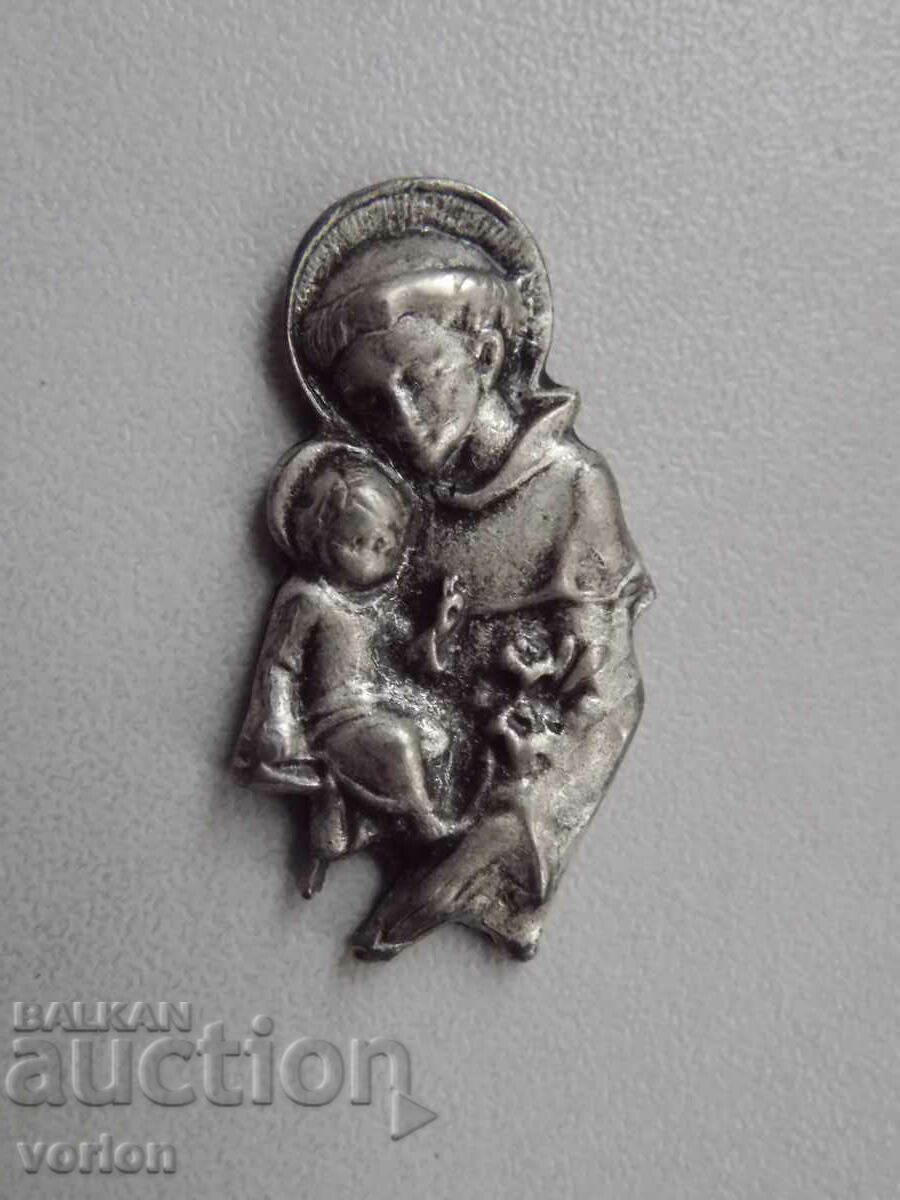 Small metal applique - Christianity.