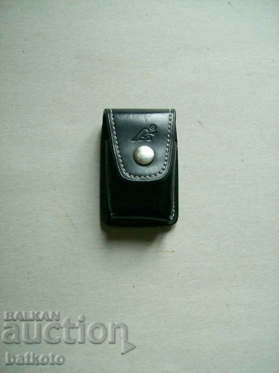 An old lighter case