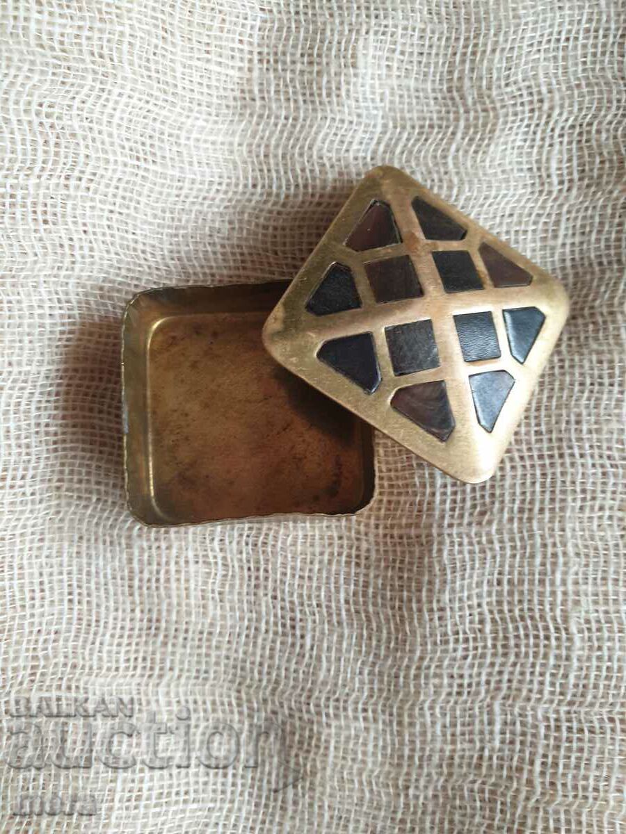 Delivery of A small brass box with applied hornbone tiles Delivery of A small brass box with applied hornbone tiles