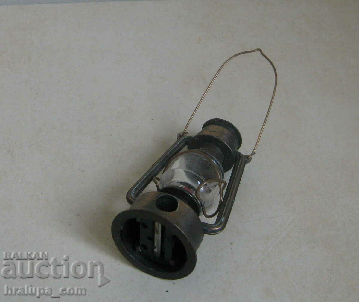 Old sharpener metal lantern with price 20.00 BGN | € 10.23 Old sharpener metal lantern with price 20.00 BGN | € 10.23