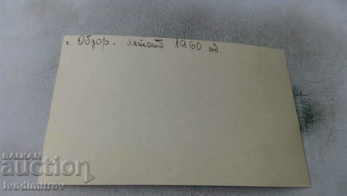 Ms. Obzor A man in a swimsuit and a swimming cap on a wooden pier with price 3.65 BGN | € 1.87