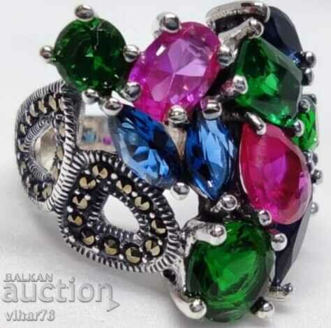 Auction Silver Ring with a bouquet of ruby stones and zirconium Auction Silver Ring with a bouquet of ruby stones and zirconium