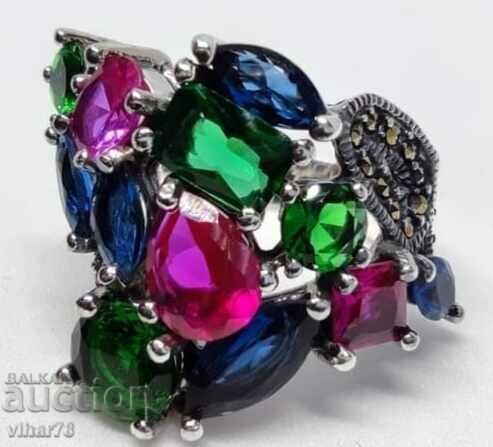 Delivery of Silver Ring with a bouquet of ruby stones and zirconium Delivery of Silver Ring with a bouquet of ruby stones and zirconium