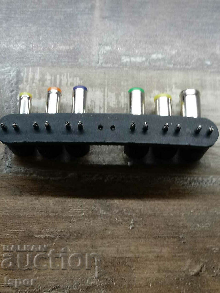 Auction  Interchangeable connectors for laptop chargers