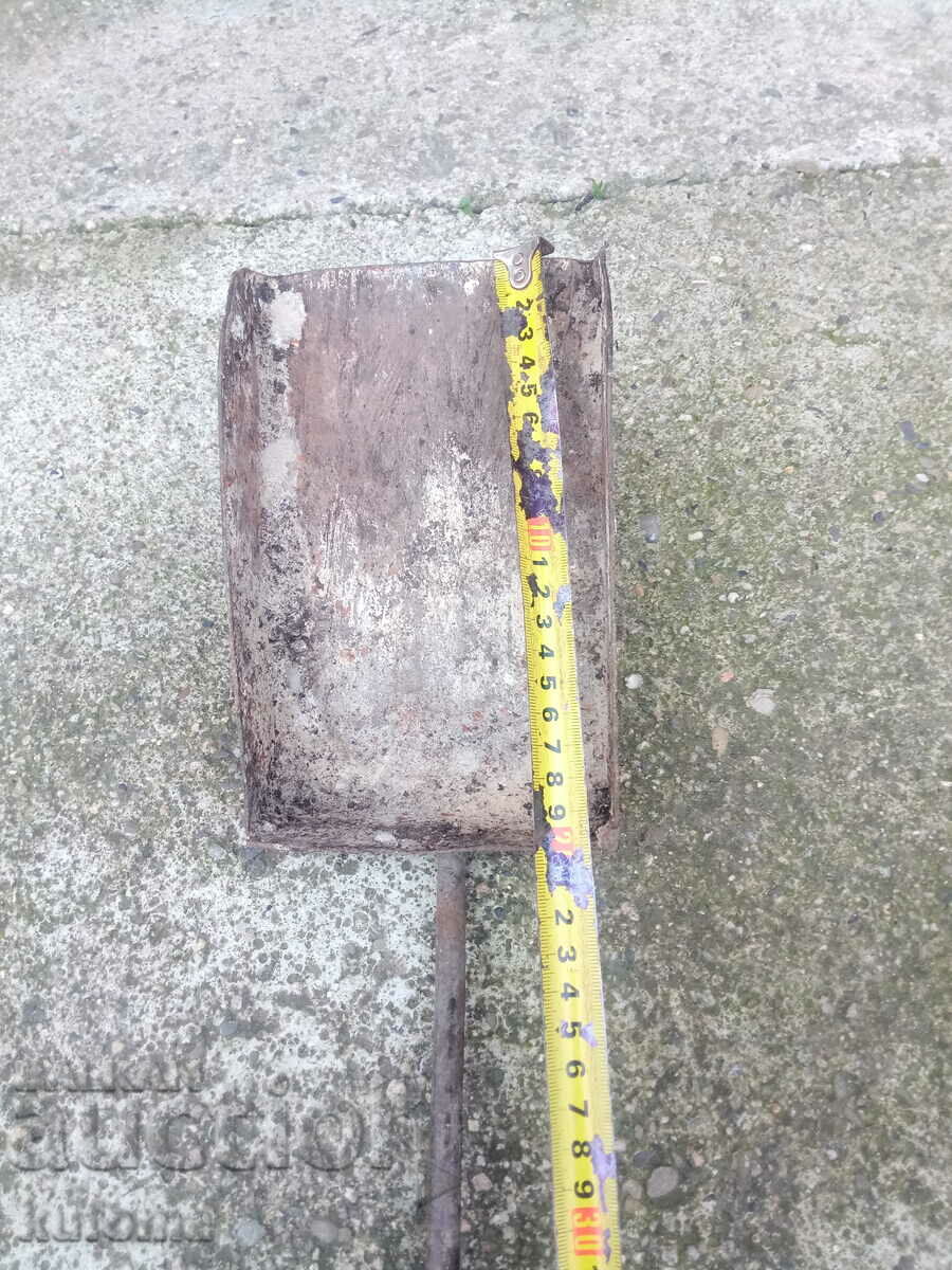 Delivery of Old iron coal shovel