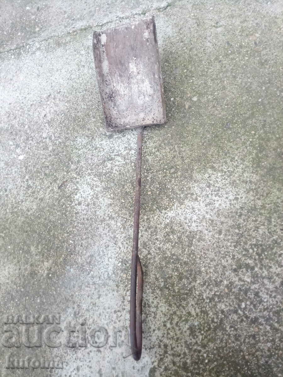 Old iron coal shovel